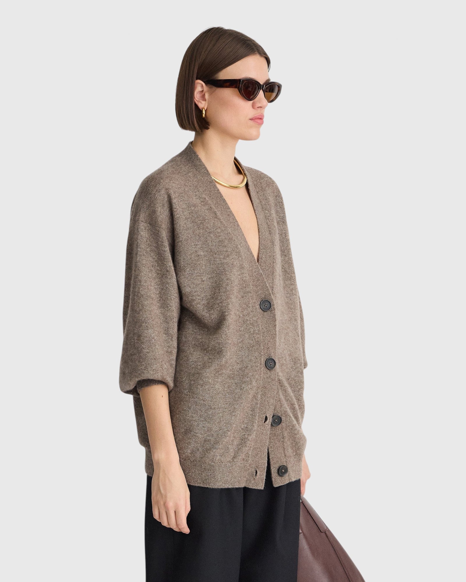 JONES + CO hazelnut cashmere-silk V-neck cardigan with drop shoulders and button front on a model
