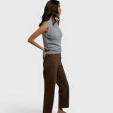 JONES + CO Fran polo tank in heather grey pointelle knit with a sleeveless cut and ribbed hem worn by a model