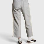 JONES + CO Claud travel track pants in heather grey cotton fleece with ivory side stripe detail, back view.