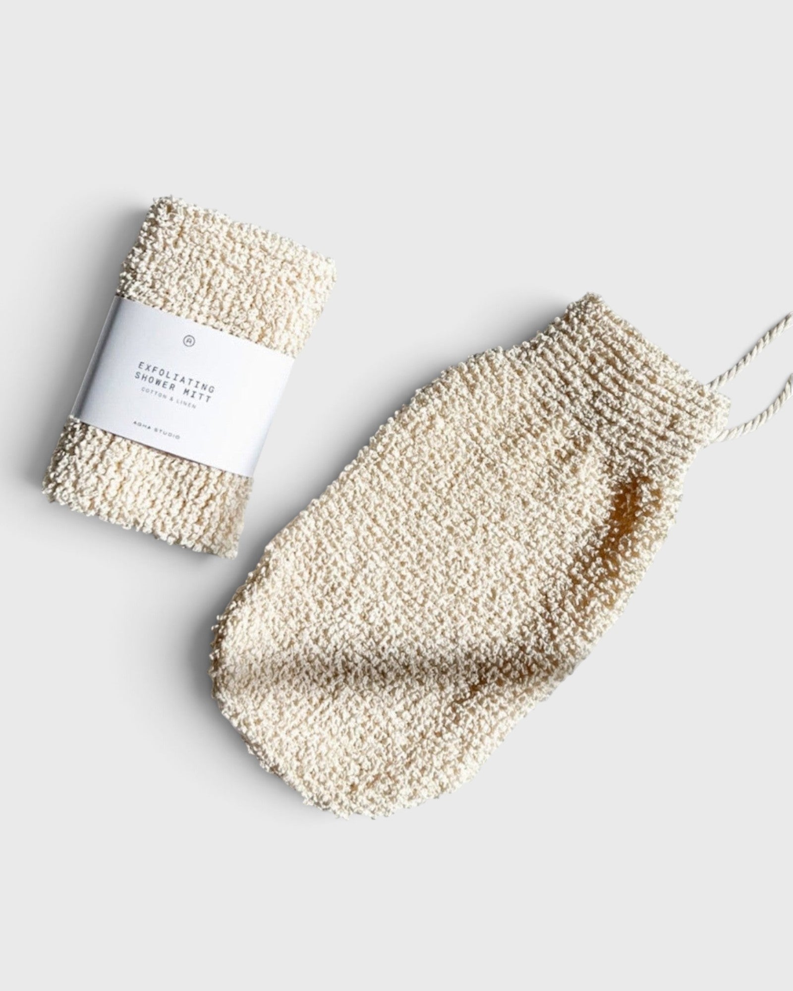 JONES + CO exfoliating shower mitt made from natural hemp and cotton fibers with a convenient hanging loop.