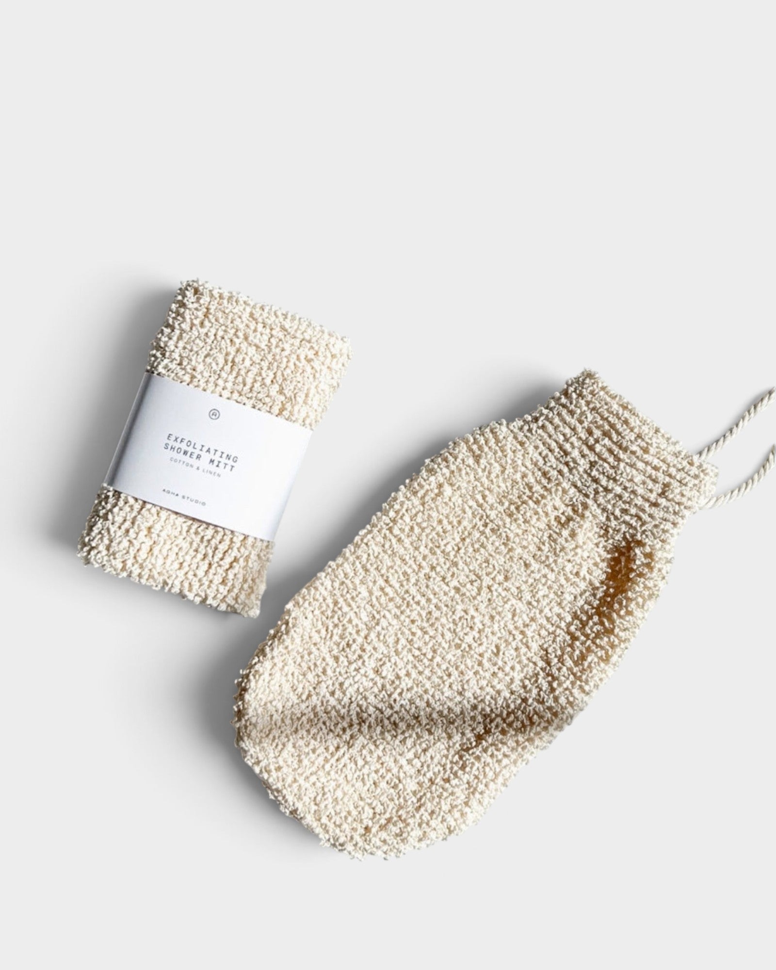 JONES + CO exfoliating shower mitt made from textured hemp and linen in a natural cream colour