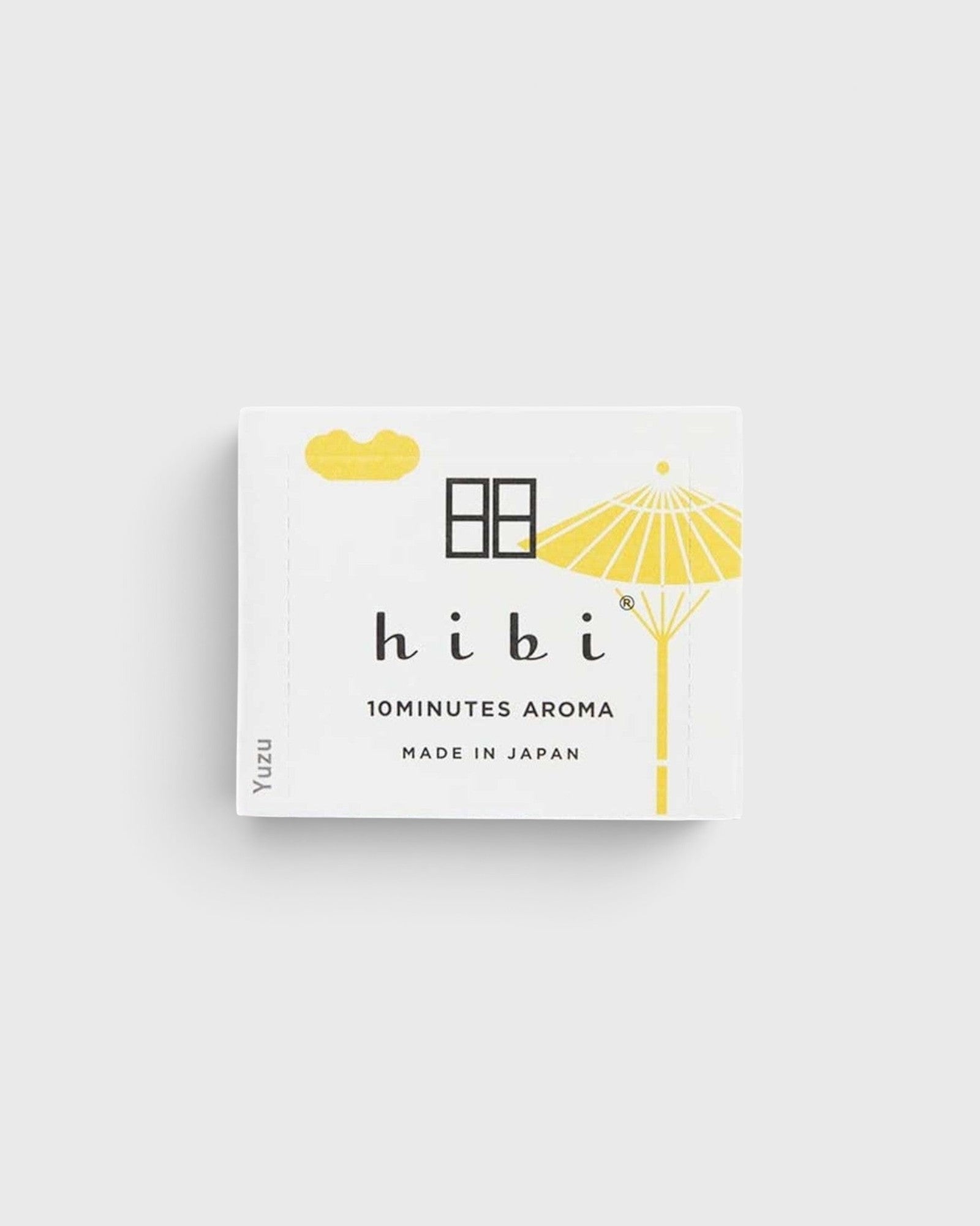 JONES + CO Hibi Yuzu incense matches box featuring a yellow umbrella illustration and 10-minute aroma branding.