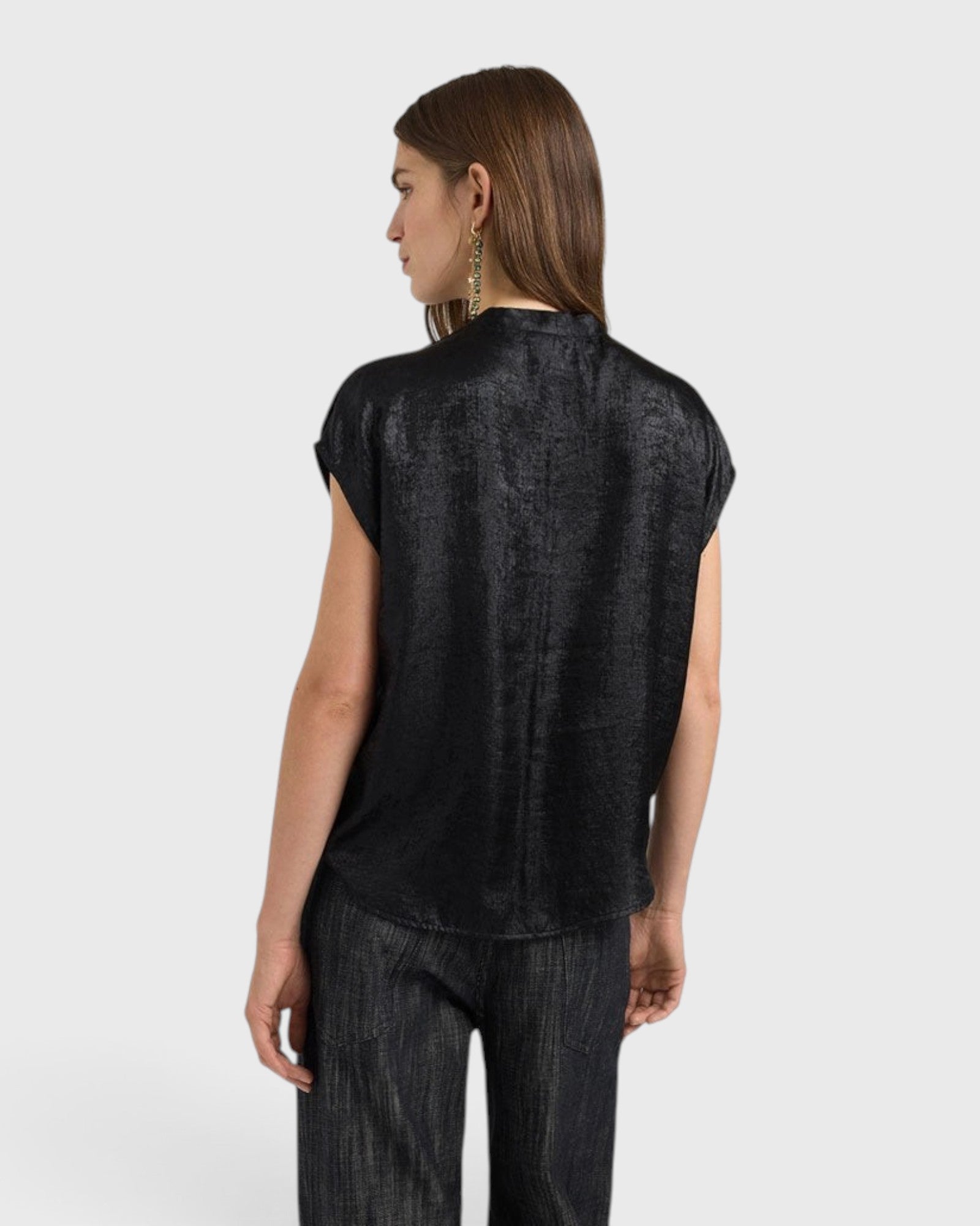 JONES + CO Hildra black sleeveless blouse in fluid laminated fabric with a shawl collar, back view.