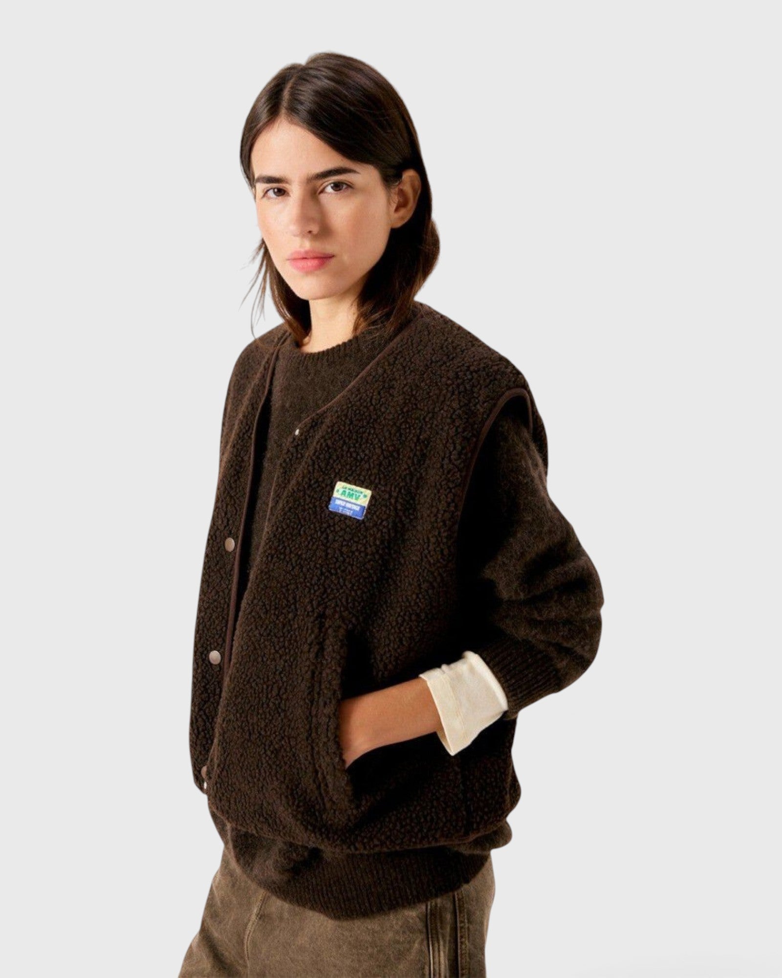 JONES + CO Hoktown sleeveless jacket in chestnut brown shearling fabric worn over a matching sweater