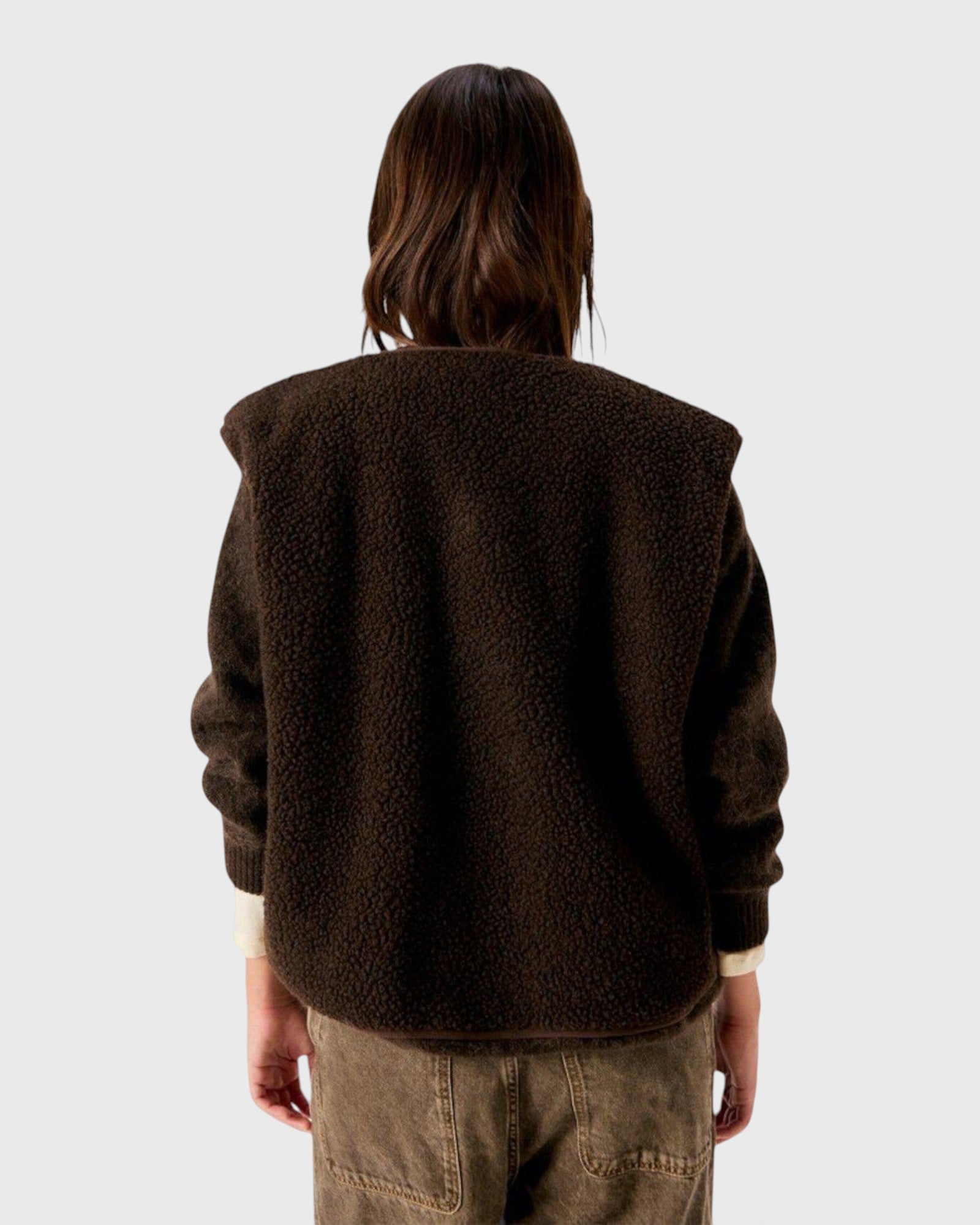JONES + CO Hoktown sleeveless jacket in chestnut tree melange shearling fabric, back view on a model.