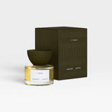 JONES + CO I-Dream Eau de Parfum, a neo-gourmand fragrance with notes of carrot seed, cypress, and vanilla in a clear glass bottle with a dark green cap and box.