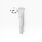 JONES + CO white tube of Infinite Layers Lip Care treatment with a Harper's Bazaar Beauty Icon 2024 award sticker.