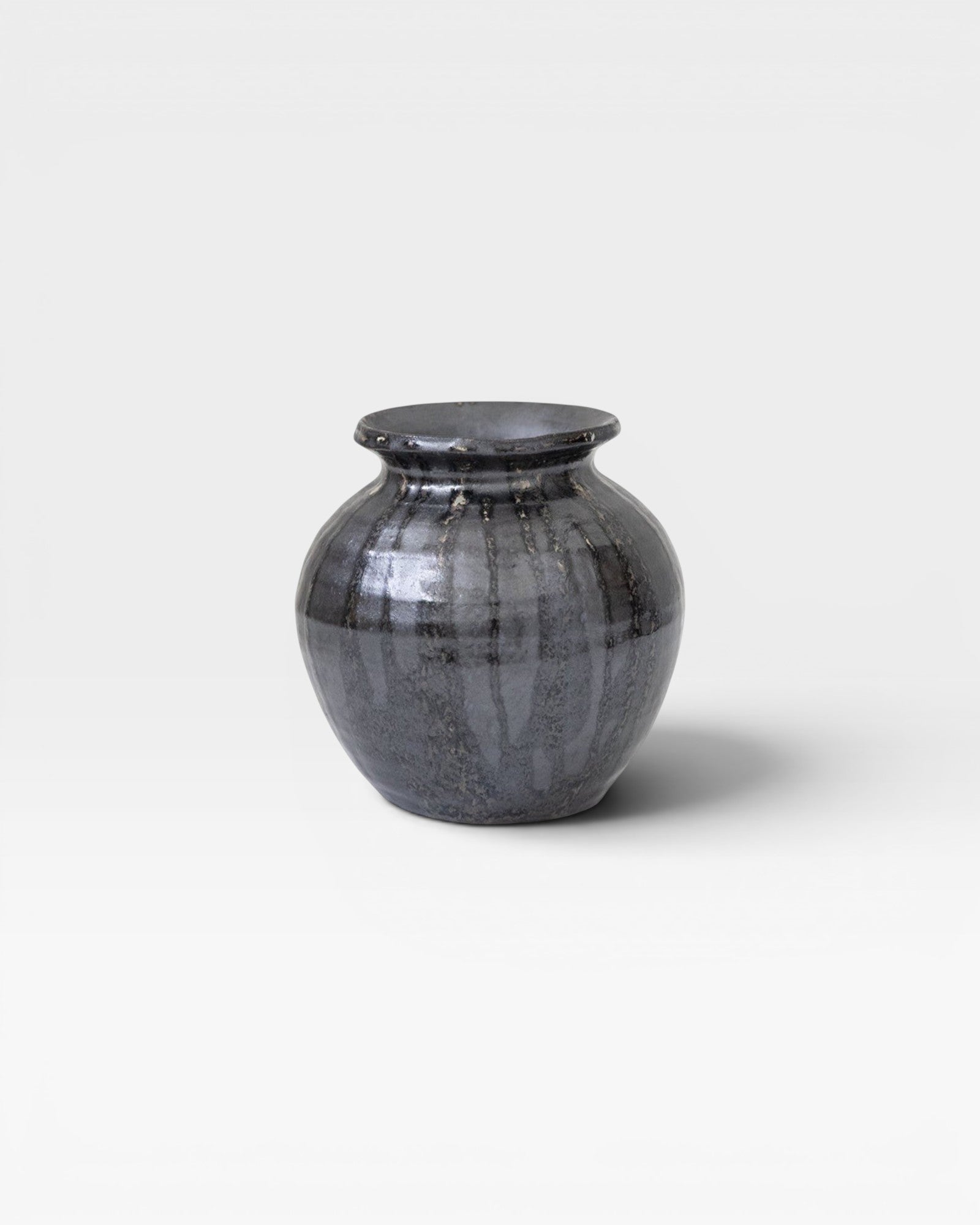 JONES + CO Ink Ceramic Vase with subtle texture and vertical glaze lines. Handmade sculptural home decor.