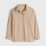 JONES + CO  apiece apart Isolde button-down shirt in sand with blue vertical stripes, featuring a structured collar and loose fit.