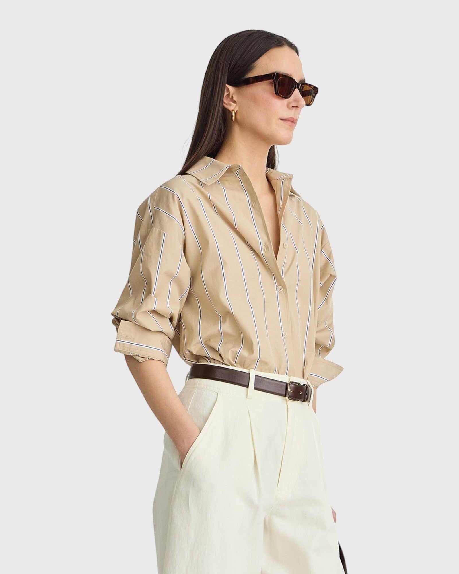 JONES + CO Isolde button-down shirt in sand and blue stripe with oversized fit and dropped shoulders on a model