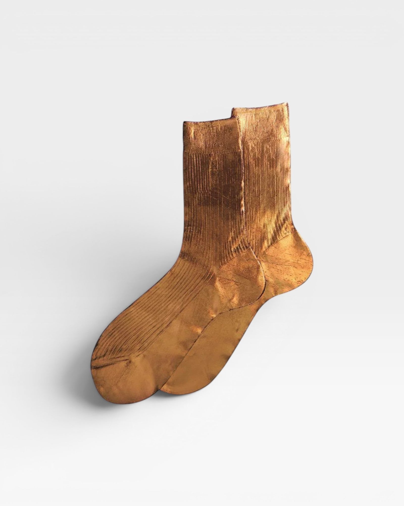 JONES + CO Italian Laminated Socks in gold, made from silk with a metallic foil overlay and ribbed texture.