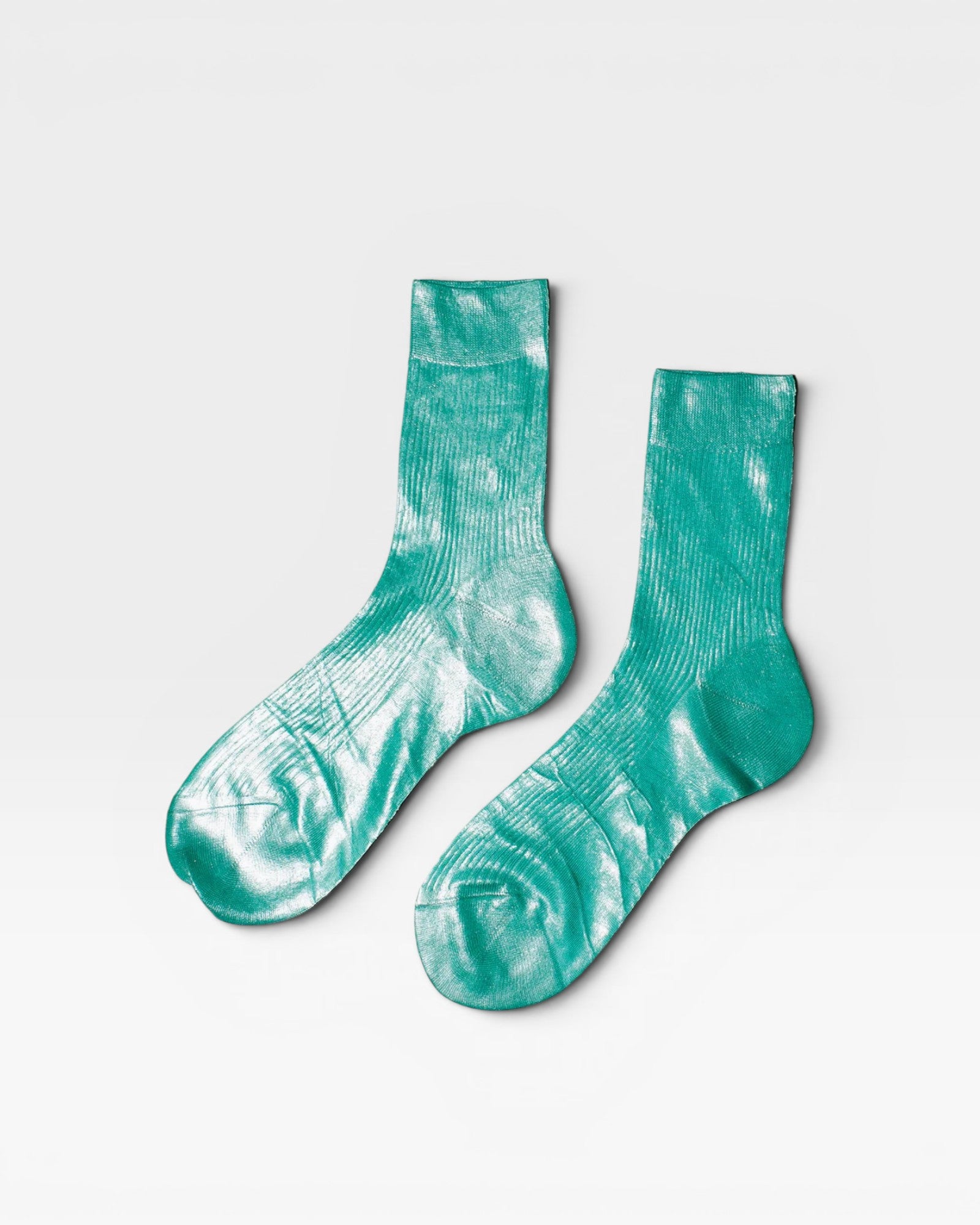JONES + CO Italian Laminated Socks in Turchino blue. Ribbed silk socks with a metallic foil overlay.