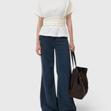 JONES + CO ivory organic cotton jersey T-shirt with a draped waist, straight neckline, and short sleeves.