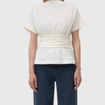 JONES + CO ivory organic cotton jersey T-shirt with a draped waist effect and straight neckline worn by a model.