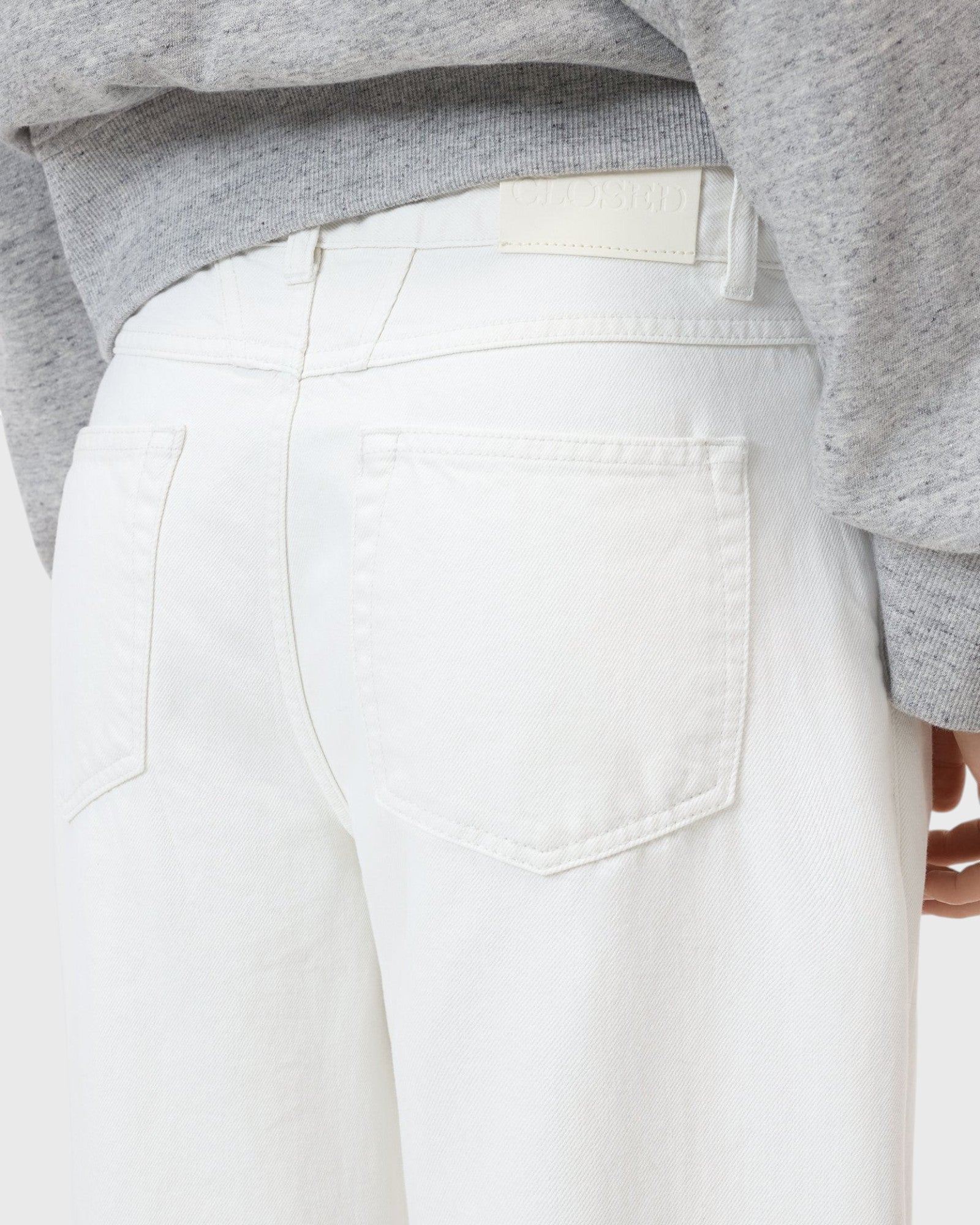 JONES + CO Jayla ivory white rigid denim jeans featuring a classic five-pocket design and mid-rise waist