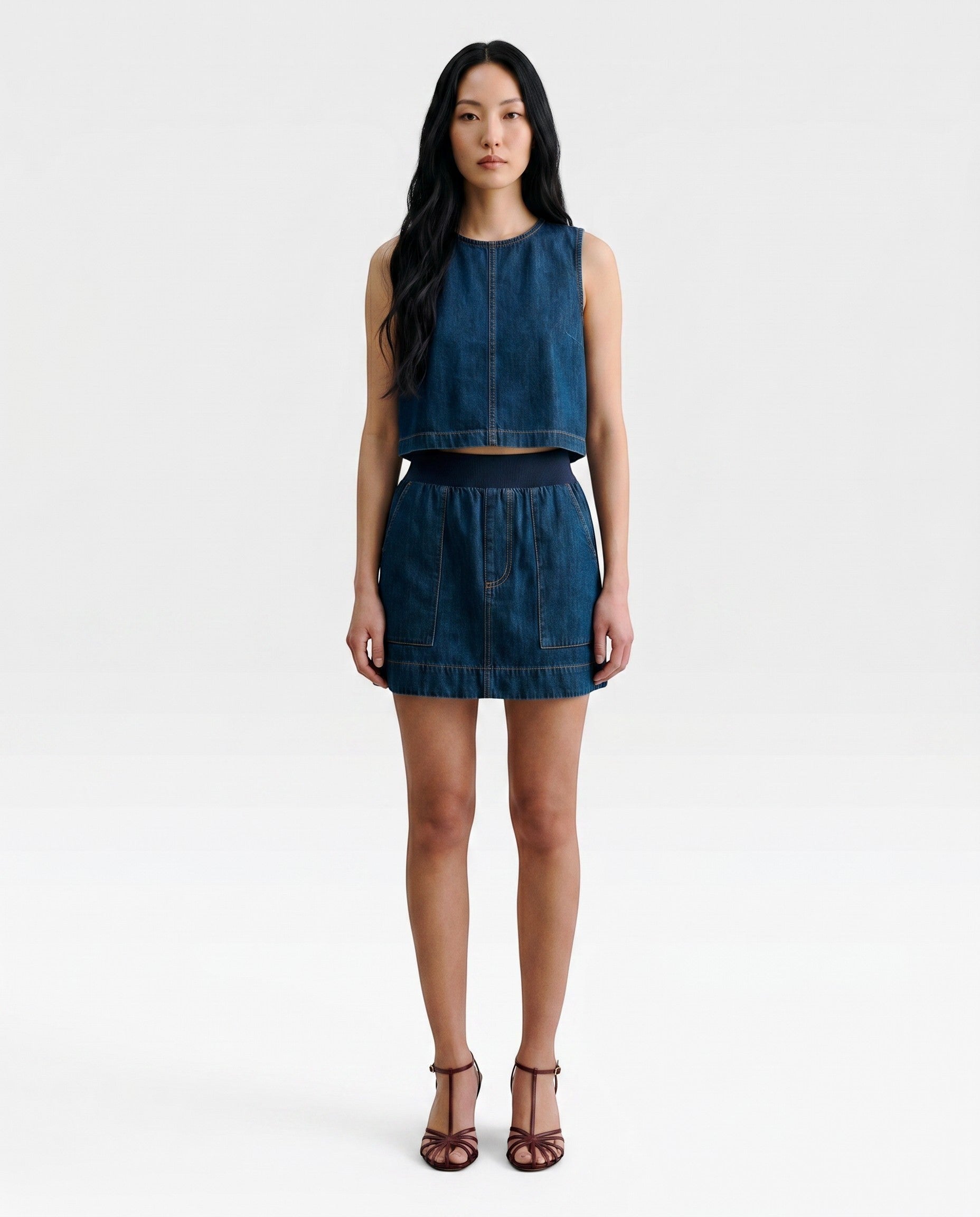 JONES + CO Jalen shorts in muddy indigo denim with elastic waist and patch pockets. Relaxed fit.