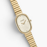 JONES + CO Jane watch featuring a 23mm gold-plated oval case, ivory mother of pearl dial, and gold link bracelet.