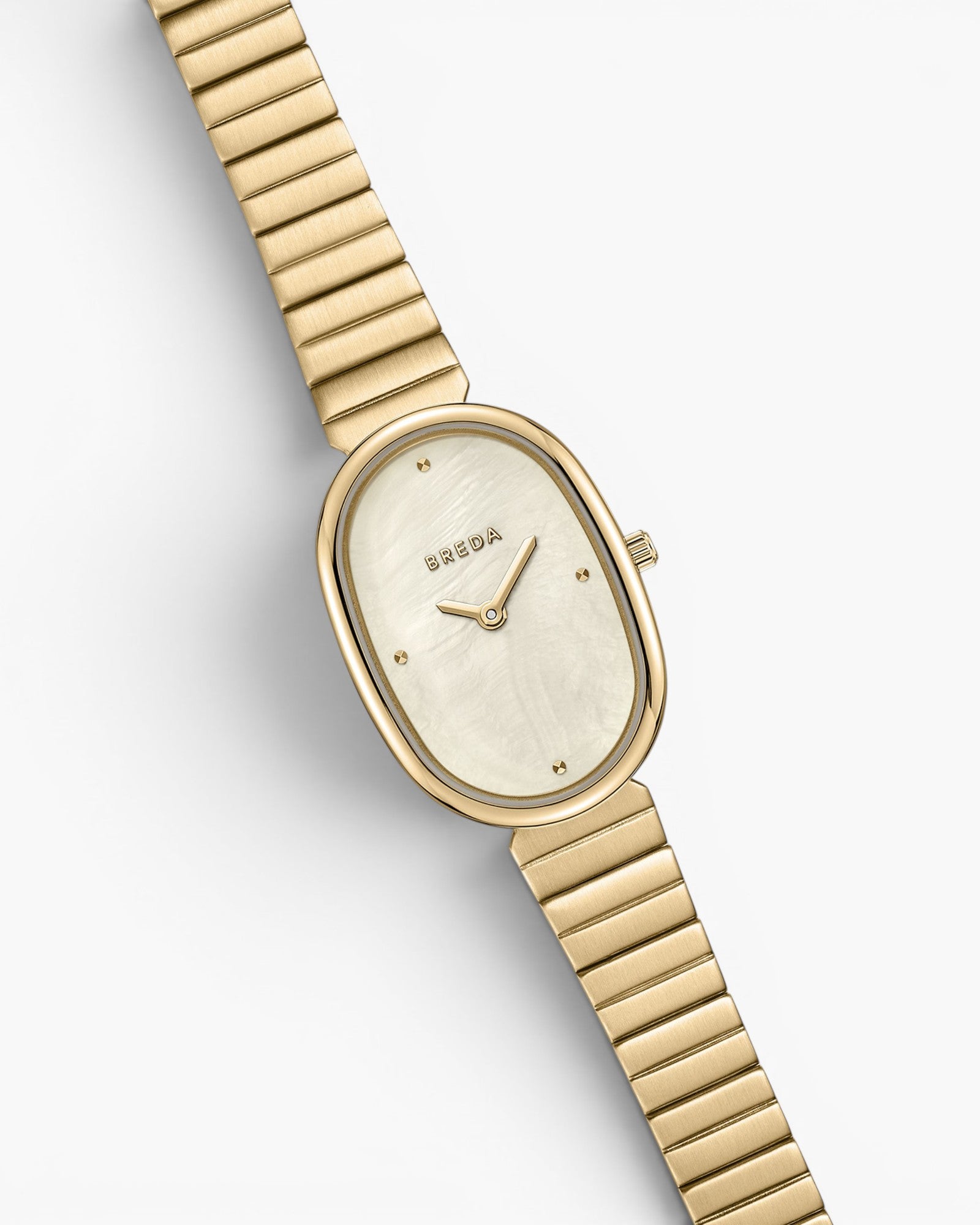 JONES + CO Jane watch featuring a 23mm gold-plated oval case, ivory mother of pearl dial, and gold link bracelet.