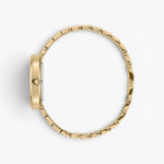 JONES + CO Jane watch featuring a gold-plated stainless steel oval case and bracelet, side profile view.
