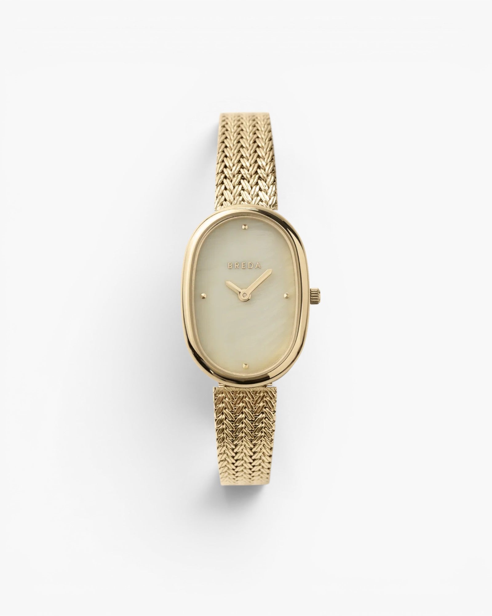 JONES + CO Jane Tethered watch with a gold oval case, champagne mother-of-pearl dial, and woven mesh bracelet.