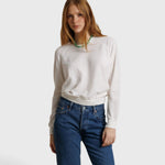 JONES + CO Jasper textured jersey crew neck sweater in natural white worn by a model with blue jeans