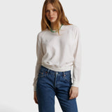 JONES + CO Jasper textured jersey crew neck sweater in natural white worn by a model with blue jeans