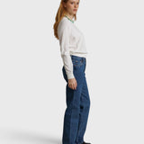 JONES + CO Jasper textured jersey crew neck sweater in natural, worn by a woman with blue jeans and black shoes.