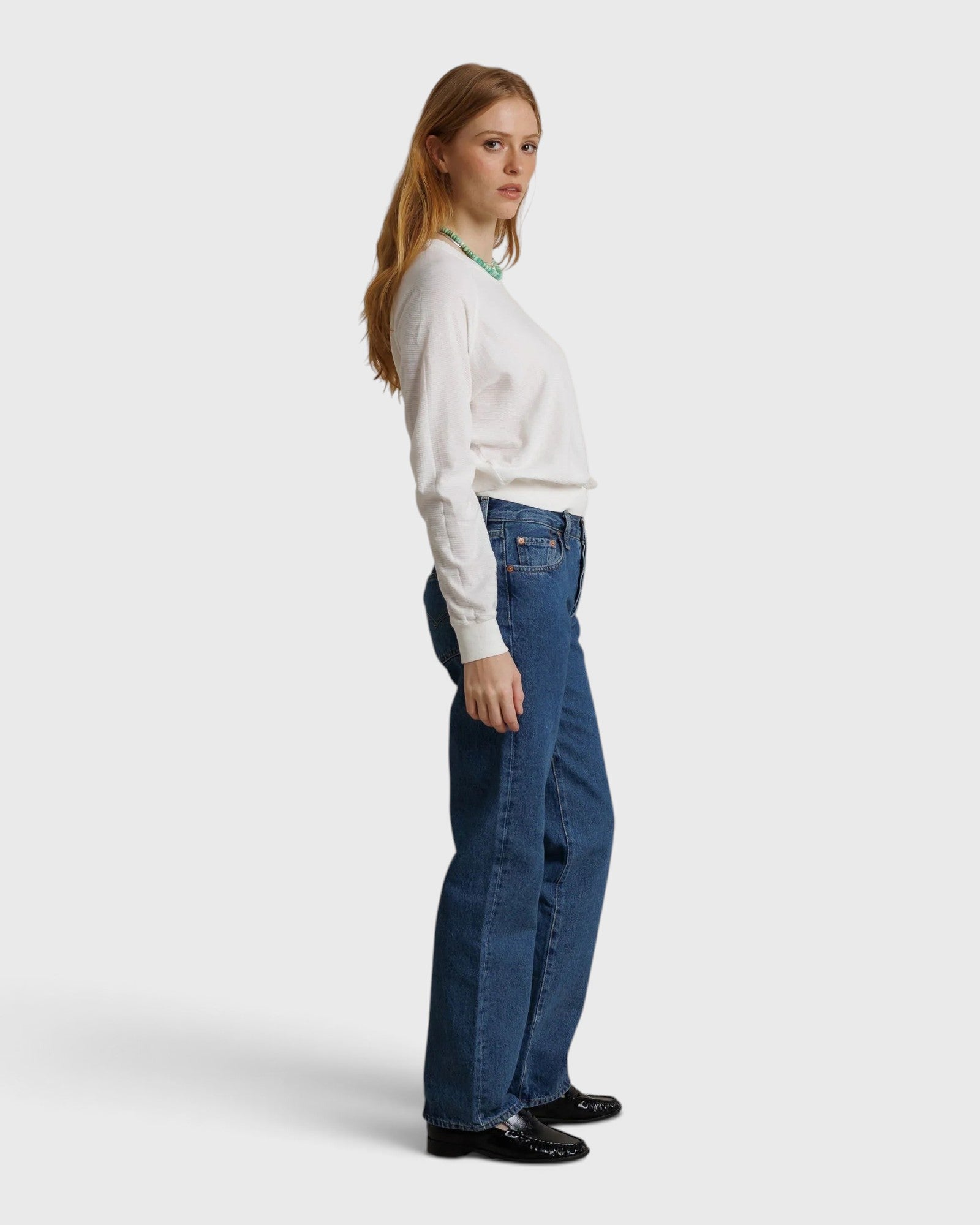 JONES + CO Jasper textured jersey crew neck sweater in natural, worn by a woman with blue jeans and black shoes.