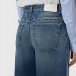 JONES + CO Jazzie barrel jeans in dark blue denim with a mid-rise waist and classic five-pocket design