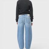 JONES + CO Jazzie barrel jeans in light blue denim with a cropped leg and five-pocket design, back view.