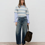JONES + CO Jazzie barrel jeans in dark blue denim with a mid-rise waist and cropped leg on a model