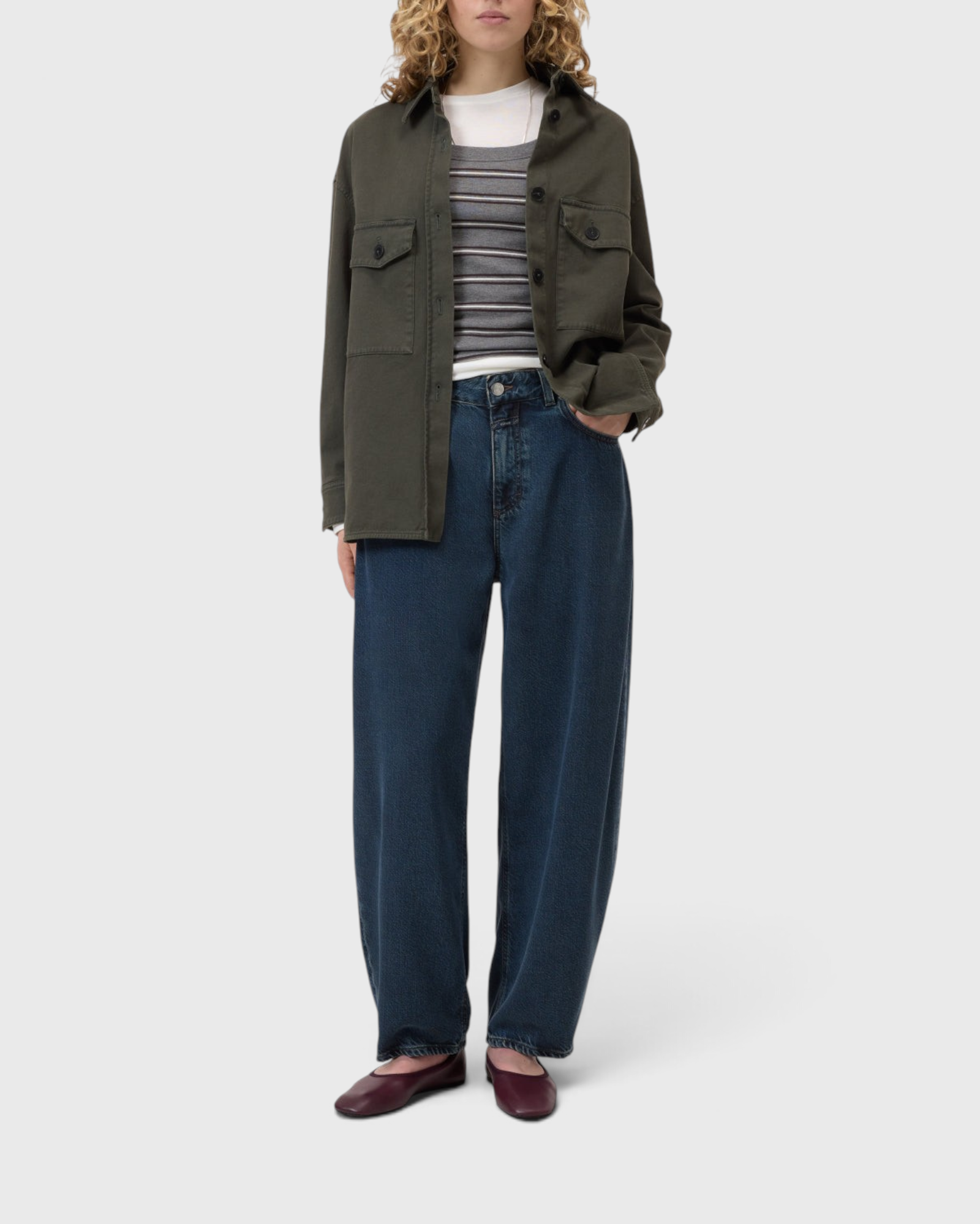 JONES + CO Jazzie dark blue barrel-fit denim jeans with mid-rise waist and cropped legs on a model