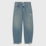 JONES + CO Jazzie barrel jeans in distressed blue denim with a mid-waist, cropped leg, and vintage patched holes.