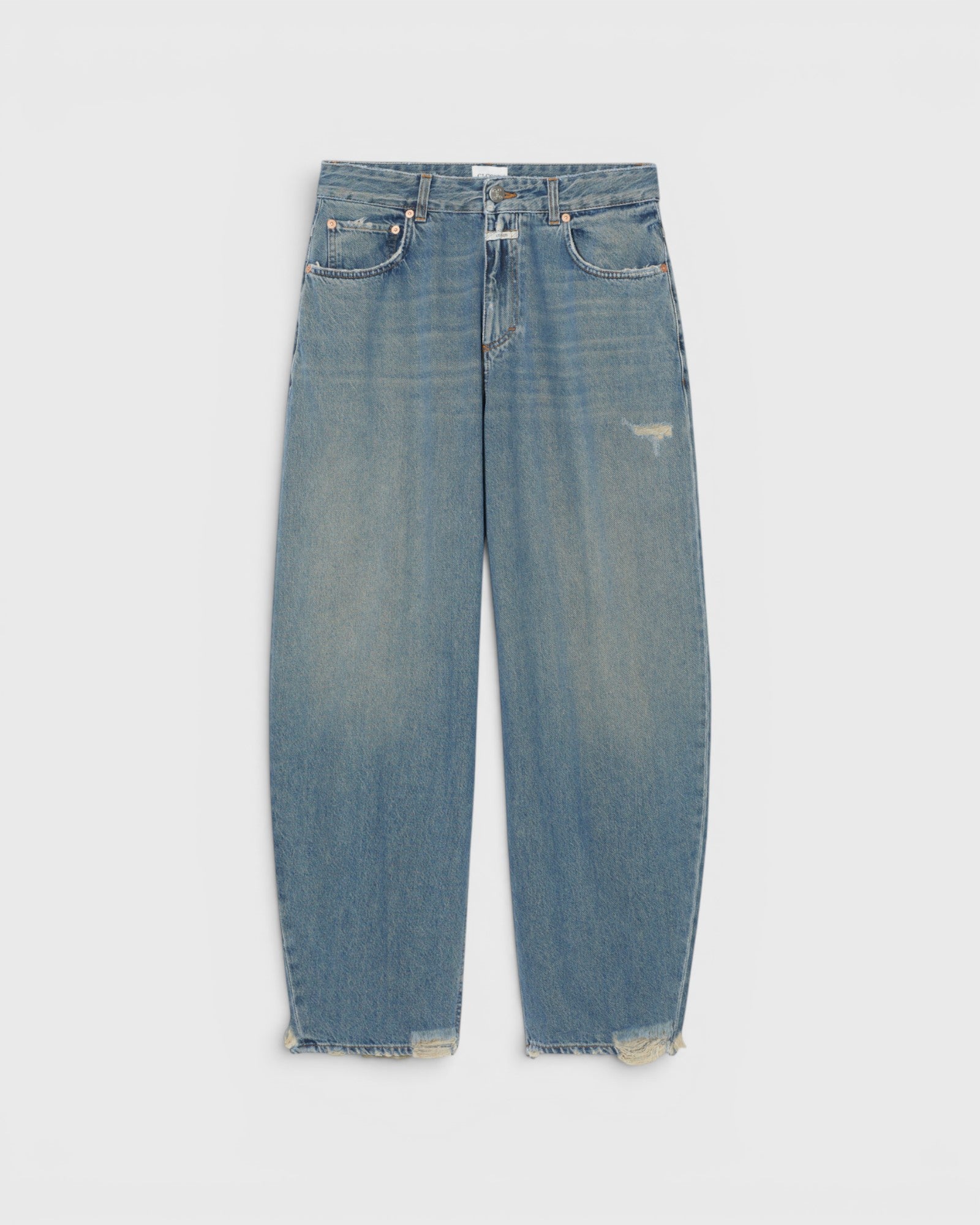 JONES + CO Jazzie barrel jeans in distressed blue denim with a mid-waist, cropped leg, and vintage patched holes.