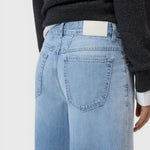 JONES + CO Jazzie barrel jeans in light blue denim with a mid-rise waist and classic five-pocket design