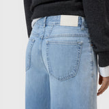 JONES + CO Jazzie barrel jeans in light blue denim with a mid-rise waist and classic five-pocket design