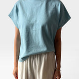 JONES + CO Jeanne Tee in sky blue. Muscle tee with dolman sleeves and high crew neck.