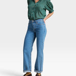 JONES + CO Jess Blouse in green Muir Tartan with short puff sleeves, pintuck details, and a curved hemline.