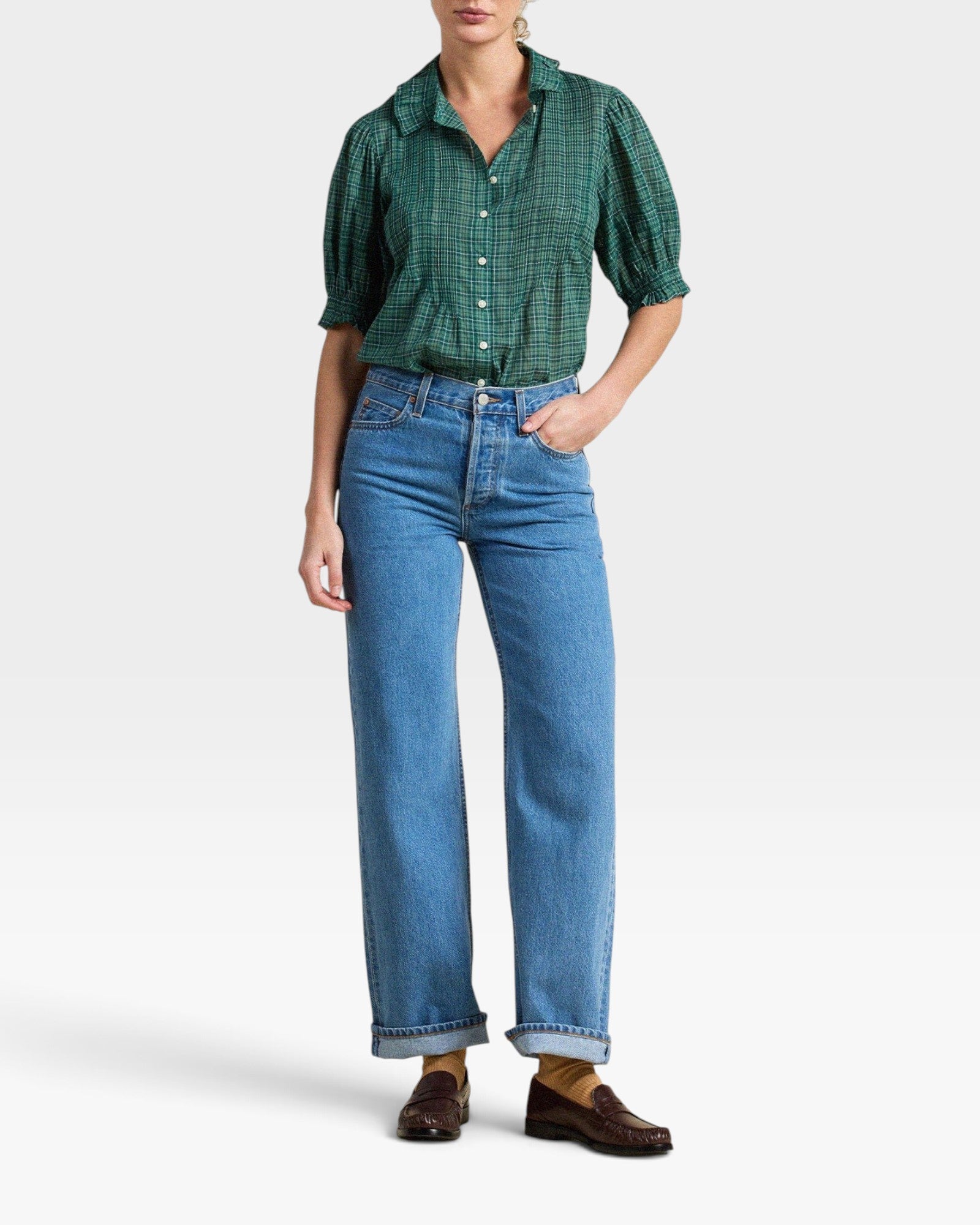 JONES + CO Jess Blouse in green Muir tartan with short puff sleeves, pintuck details, and a curved hemline.