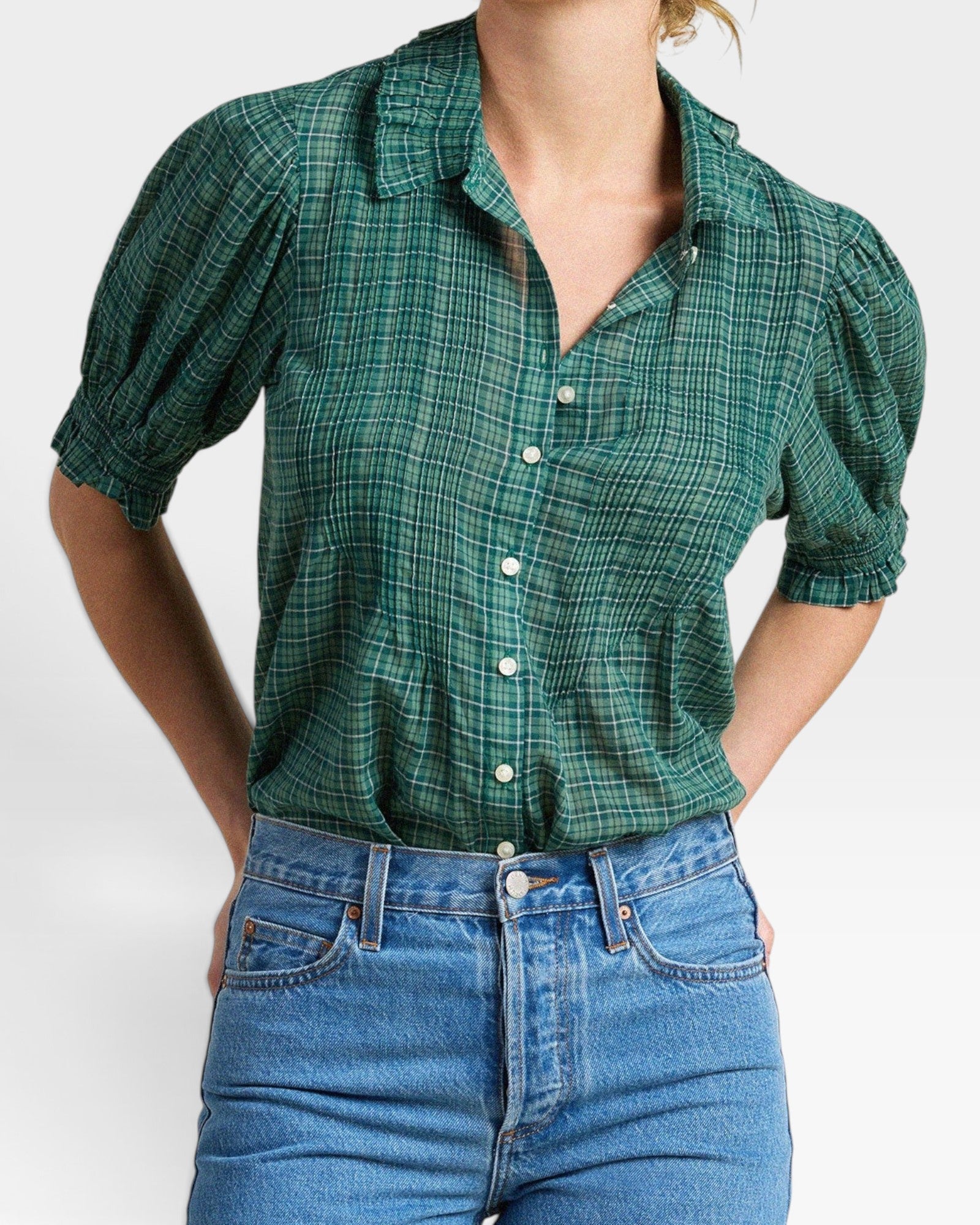JONES + CO Jess blouse in green Muir tartan with short puff sleeves, pintuck details, and a button-down front.
