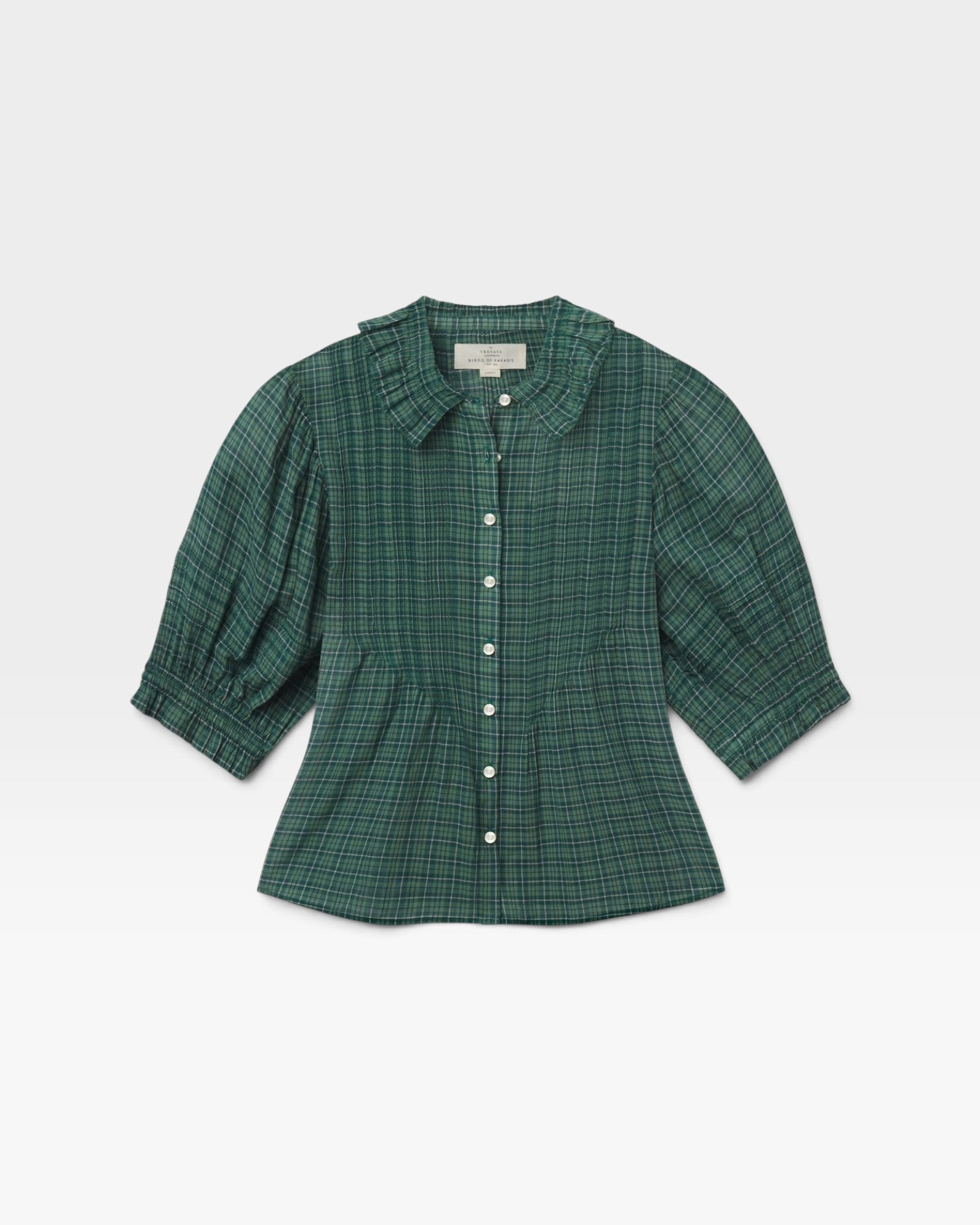 JONES + CO Jess blouse in green Muir tartan plaid with short puff sleeves, ruffled collar, and button-down front.