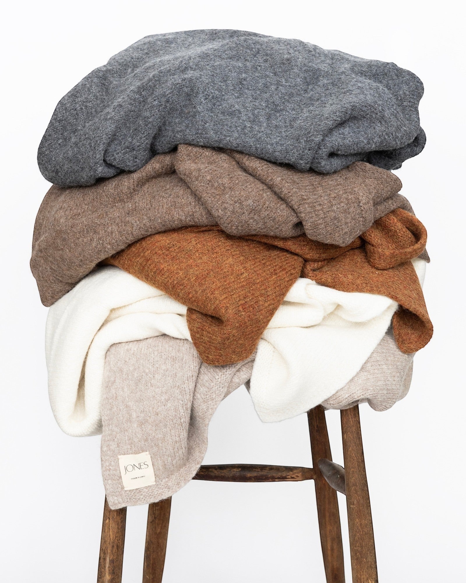JONES + CO Jones Blanket in oatmeal, grey, bark, and cream alpaca wool blend. Medium weight throw.