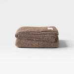 JONES + CO Jones Blanket in bark, a medium-weight alpaca wool blend throw with a soft texture.
