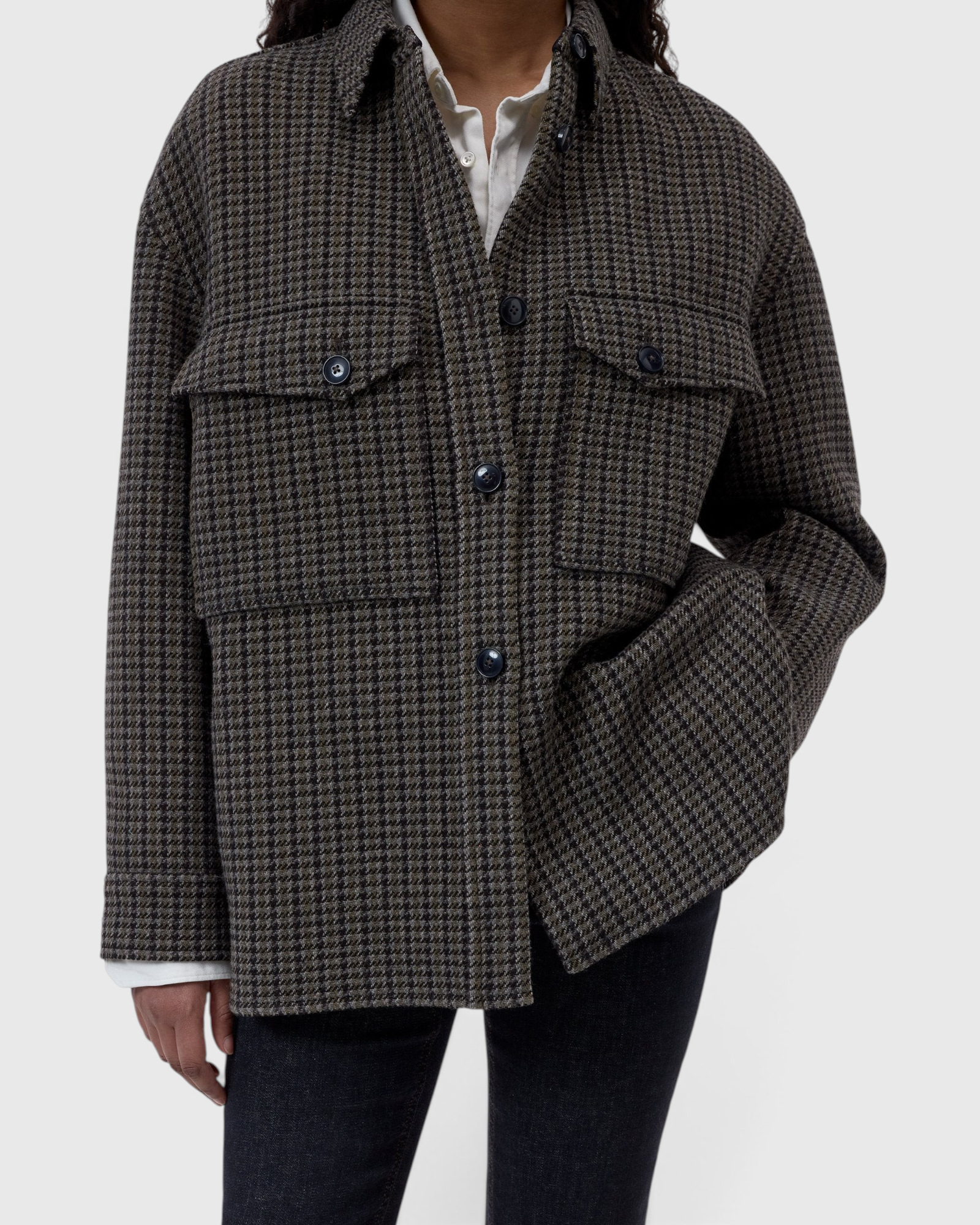 JONES + CO oversize shacket in juniper green wool-blend with a checked pattern and buttoned breast pockets.