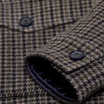JONES + CO oversized shacket in juniper green wool-blend with a multicoloured checked pattern and horn-effect buttons.