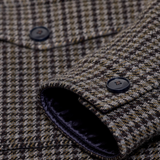 JONES + CO oversized shacket in juniper green wool-blend with a multicoloured checked pattern and horn-effect buttons.
