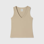 JONES + CO Kana Tank in dune beige with a deep scoop neckline and ribbed knit fabric in a fluid, close fit.