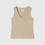 JONES + CO Kana Tank in dune beige with a deep scoop neckline and ribbed knit fabric in a fluid, close fit.