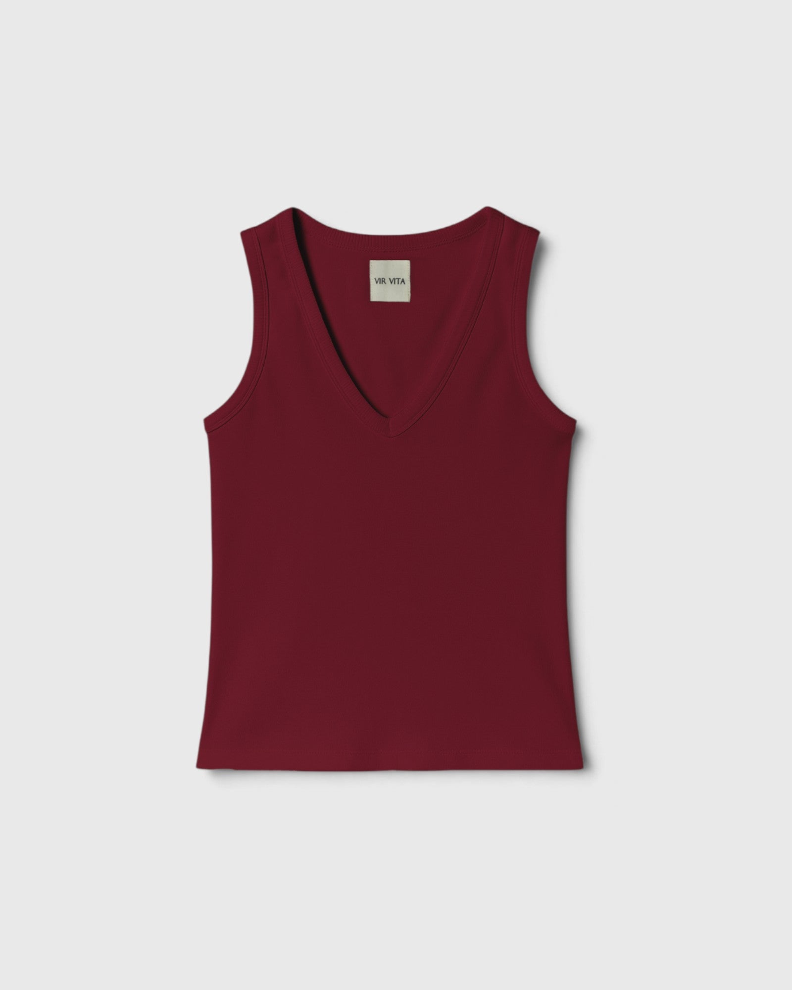 JONES + CO Kana Tank in merlot red featuring a deep scoop neckline and finely ribbed knit fabric.