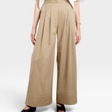 JONES + CO Khaki Organic Crisp cotton wide-leg pleated high-waisted trousers with elastic back waistband and faux button fly.
